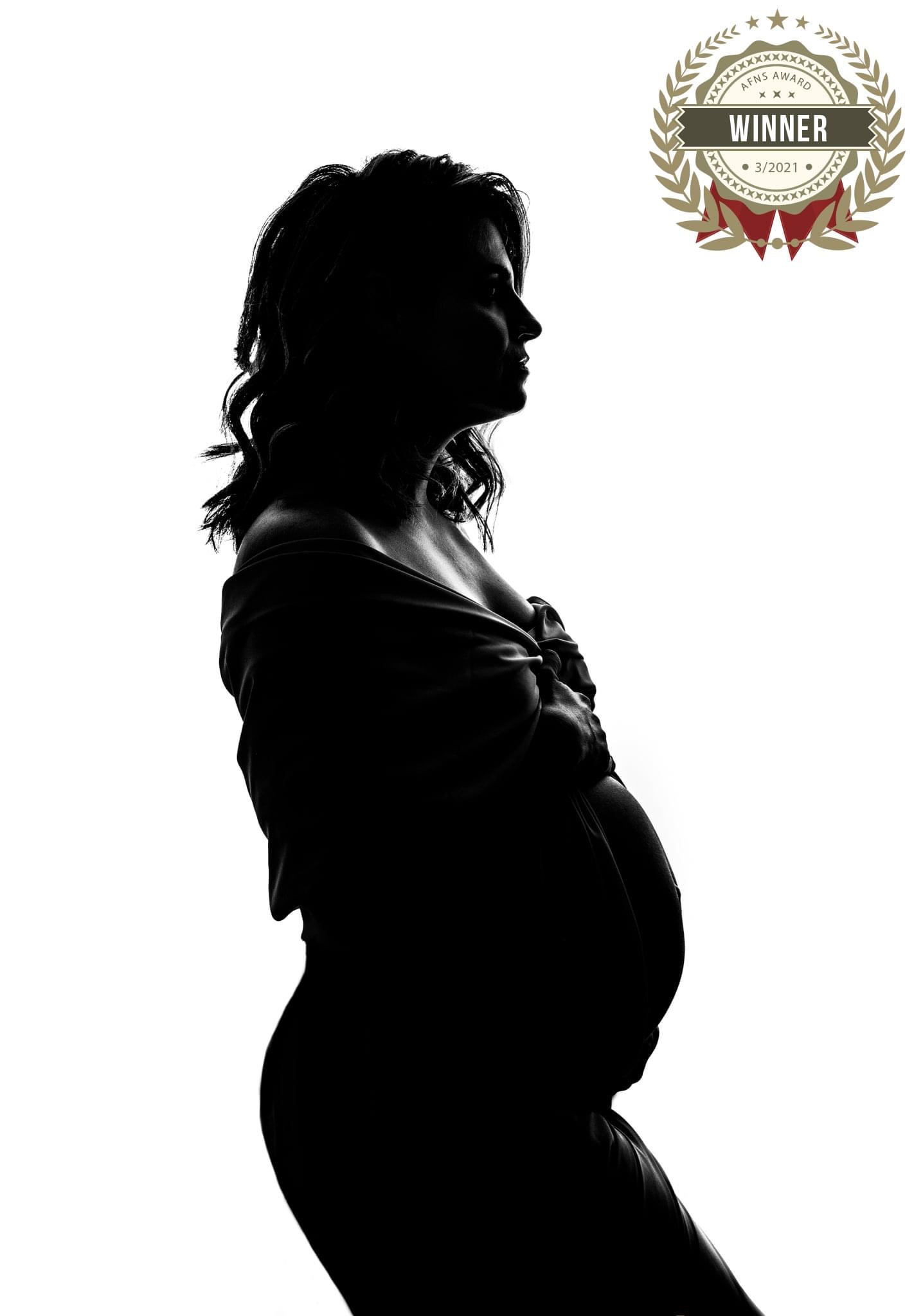 Award winning maternity backlit image